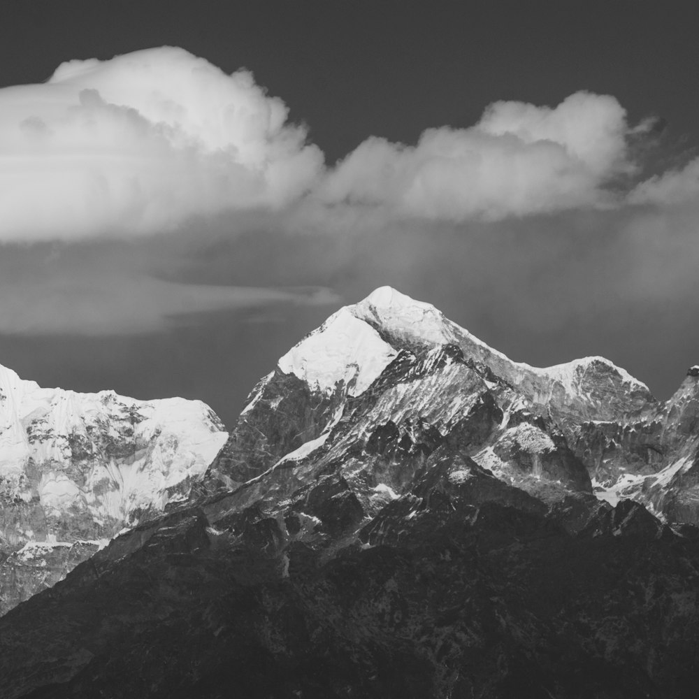 a black and white photo of a mountain range