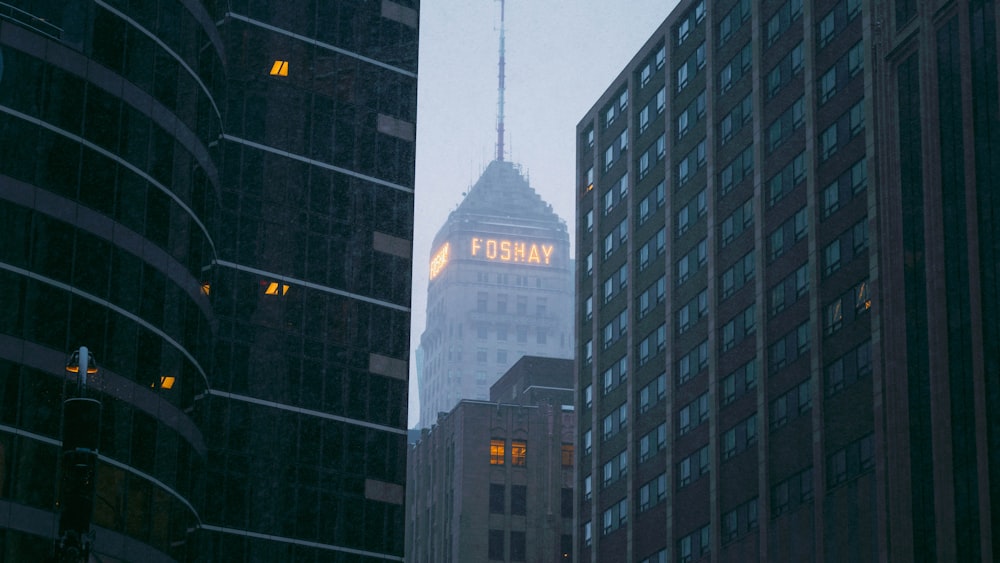 a view of a very tall building in the city