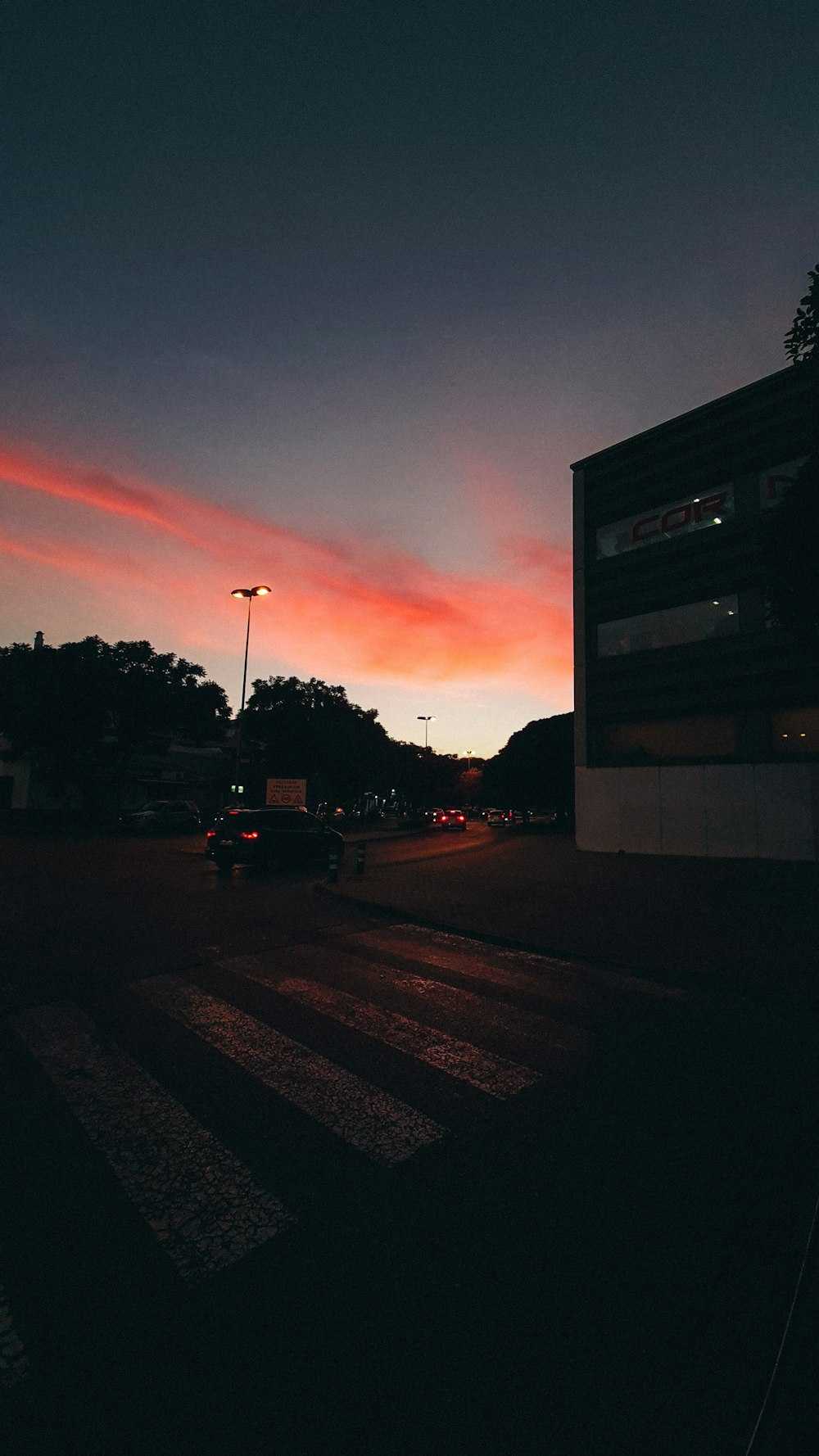 a traffic light sitting on the side of a road