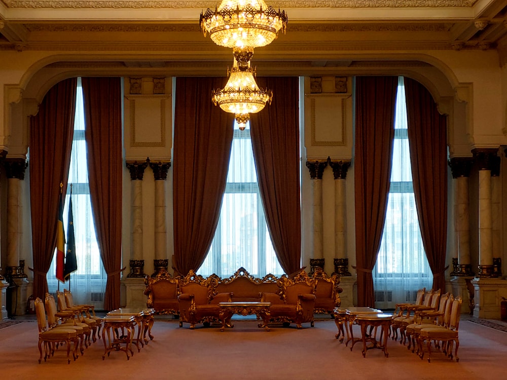 a large room with a chandelier hanging from the ceiling