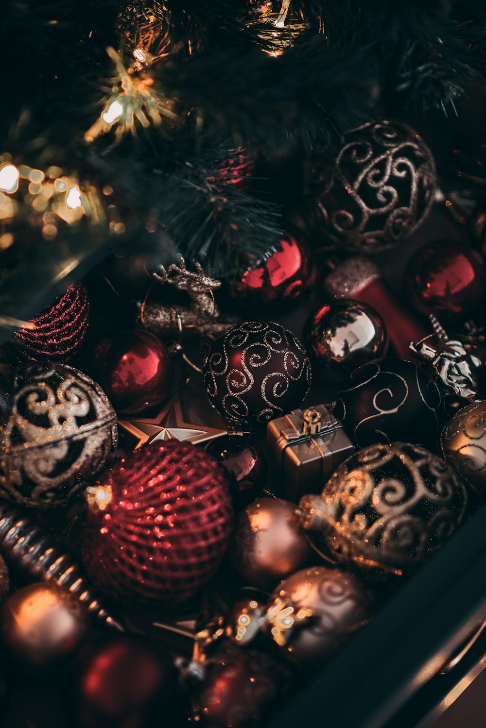 a close up of a christmas tree with ornaments