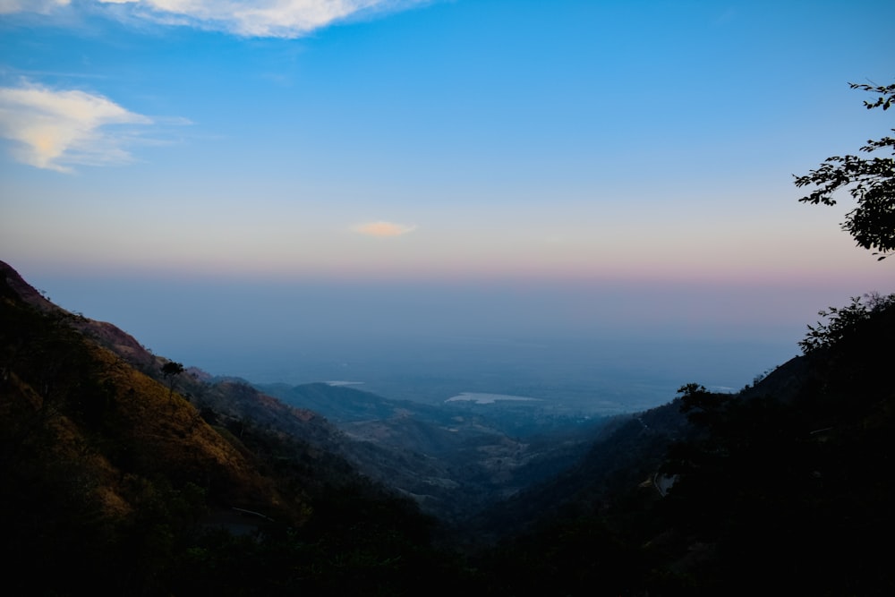 a view of a valley from a hill