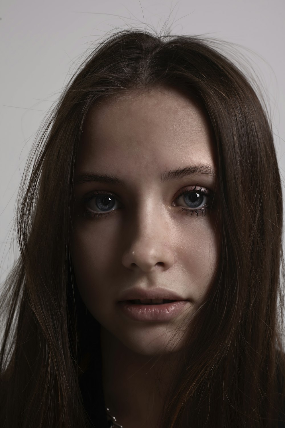 a close up of a person with long hair