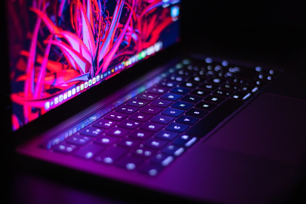 a close up of a laptop with a keyboard