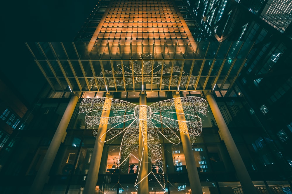 a large lighted dragon in the middle of a building