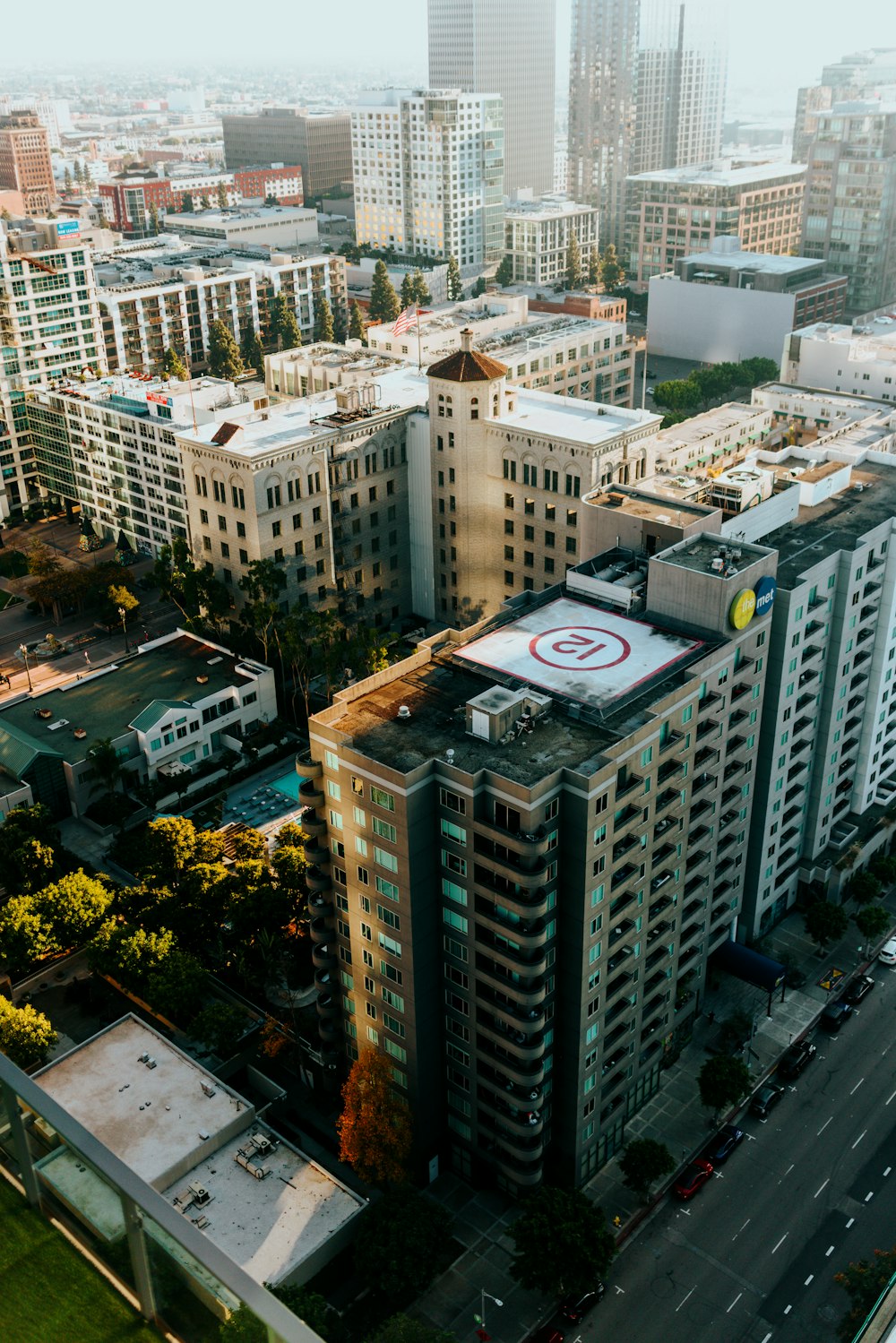 an aerial view of a city with tall buildings