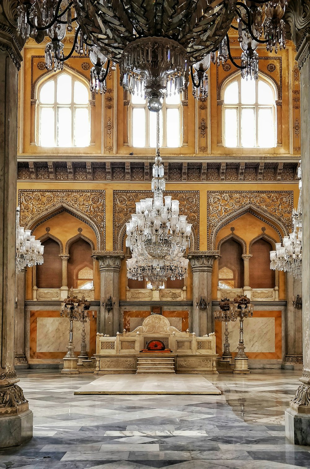 a chandelier hanging from the ceiling of a building