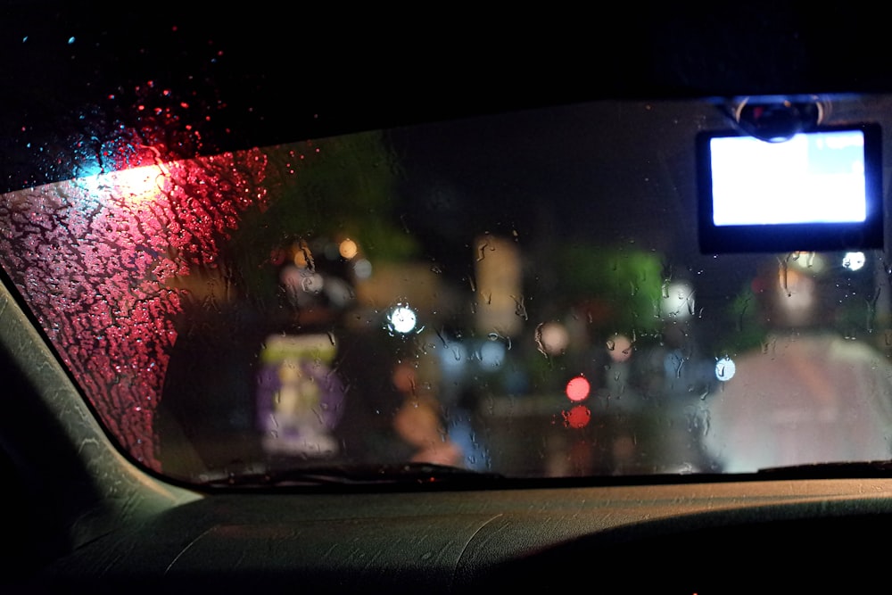 a blurry picture of a city street at night