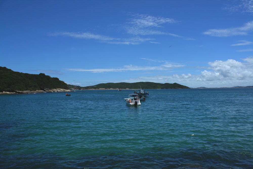 a boat floating on top of a large body of water