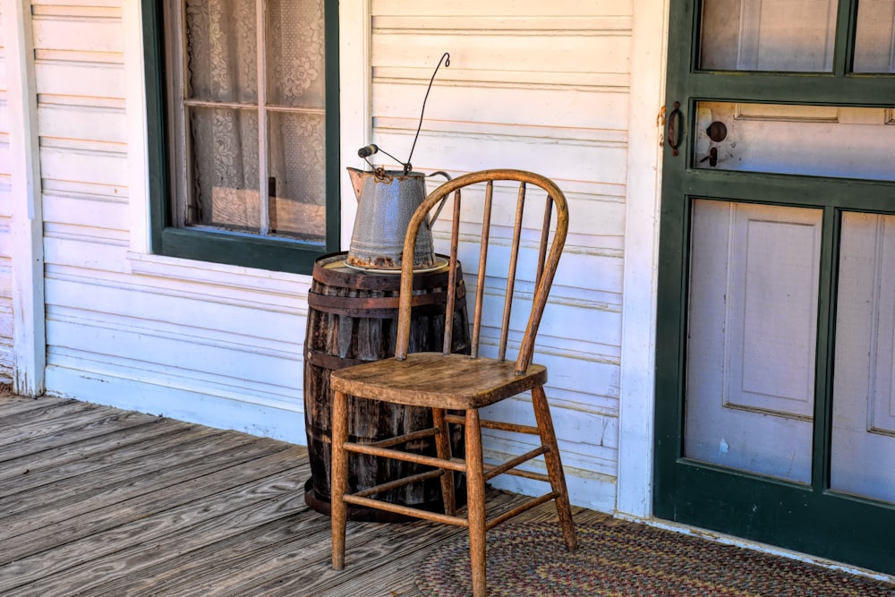 a wooden chair sitting on top of a wooden floor