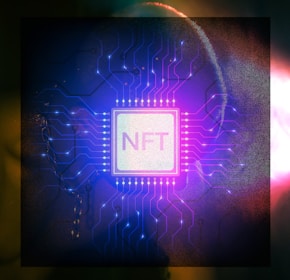 a close up of a circuit board with a neon light