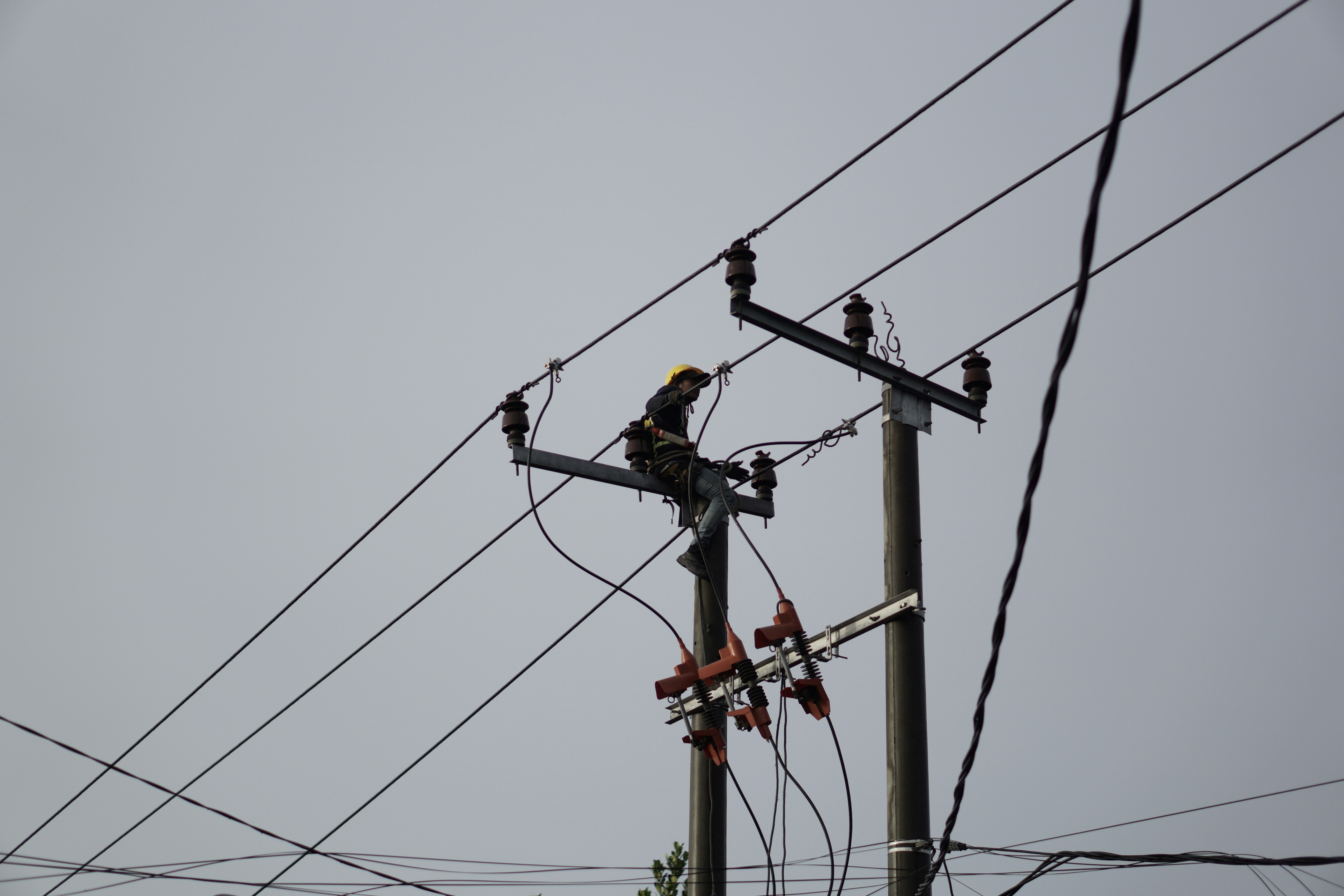 a power pole with power lines and wires