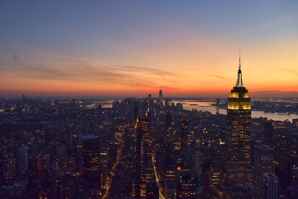 a view of a city at night from the top of a building