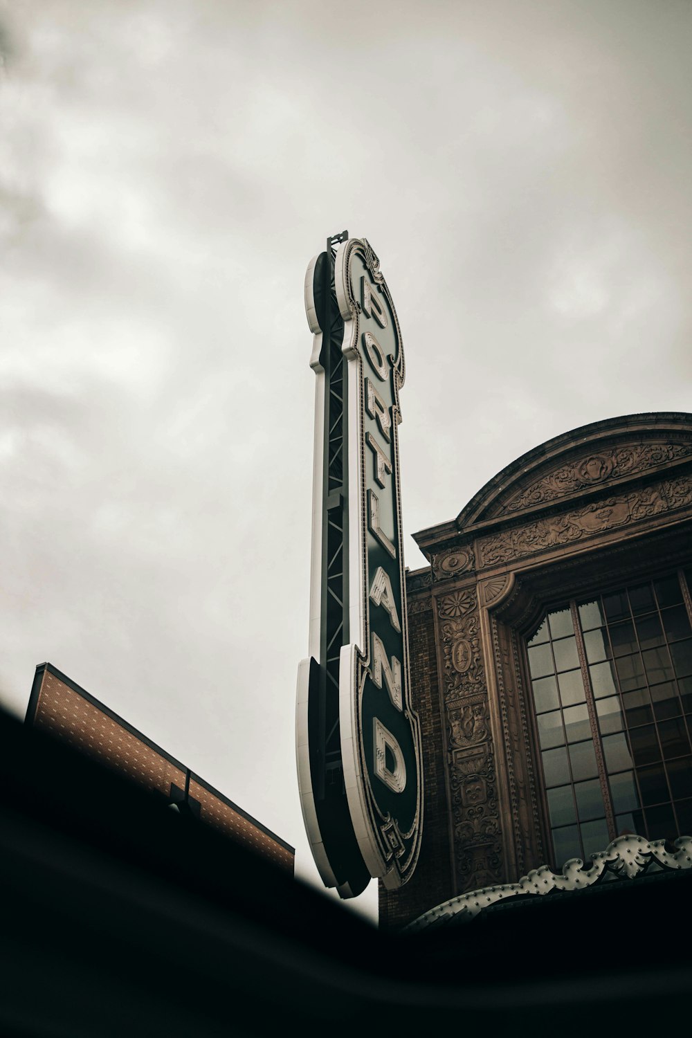 a sign that is on the side of a building