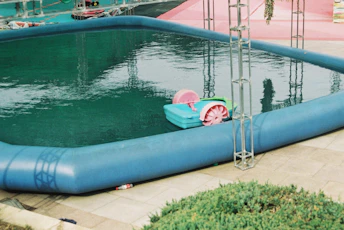 an inflatable swimming pool with a toy in it