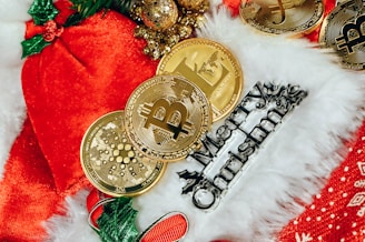 a pile of bitcoins sitting on top of a pile of christmas decorations