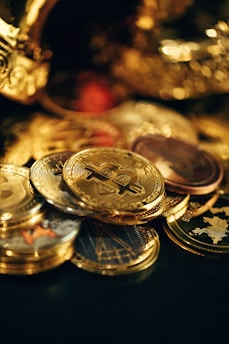 a pile of gold coins sitting on top of a table