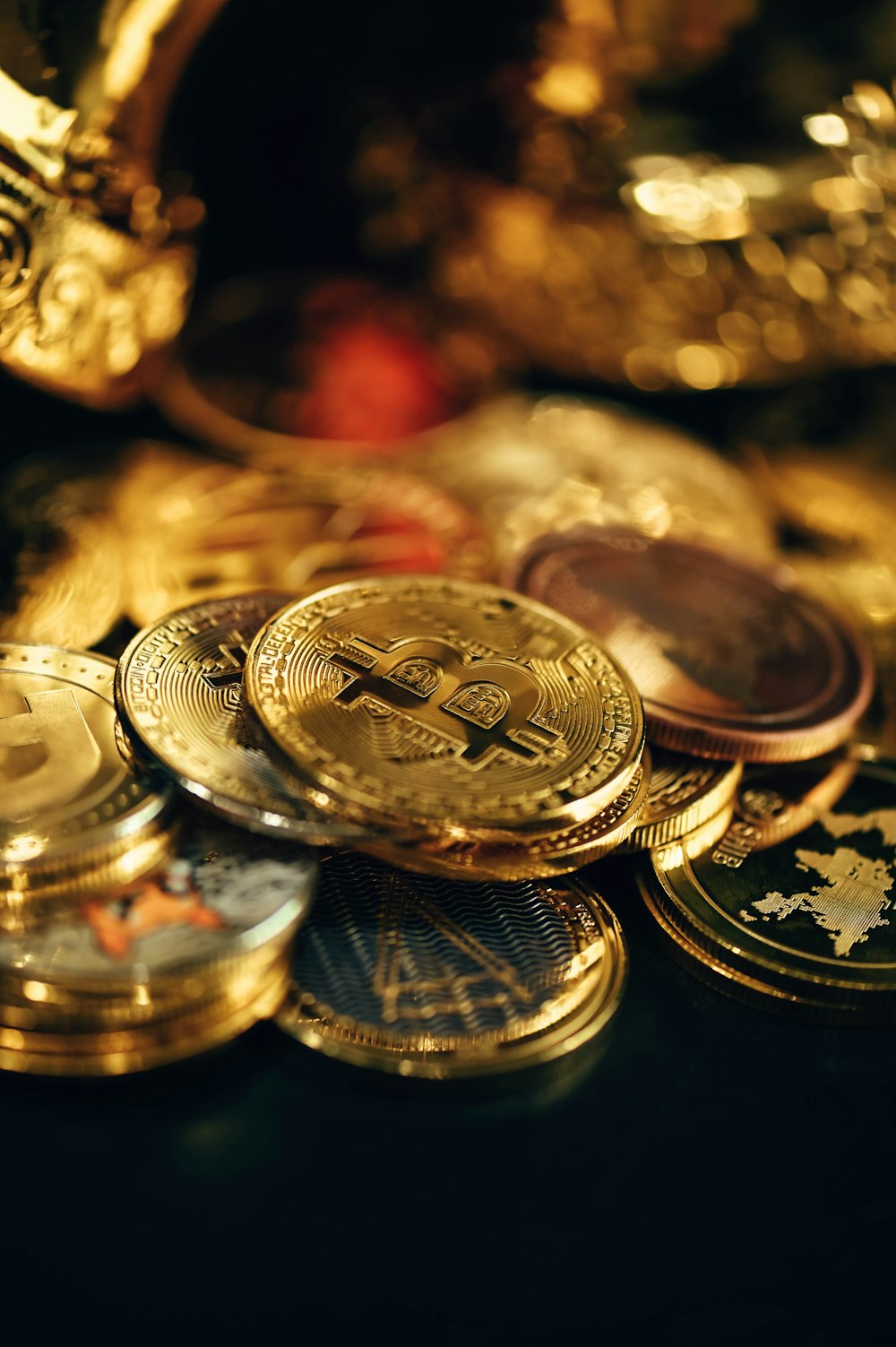 a pile of gold coins sitting on top of a table