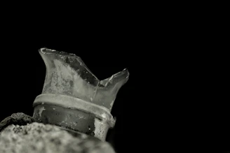 Close-up of a CE-certified single-shaft shredder slicing through PET bottles with precision