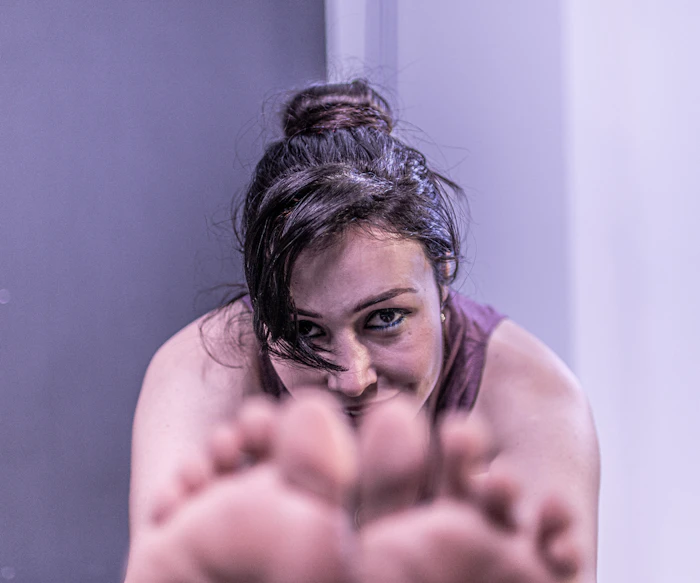 Student in a supported yoga pose