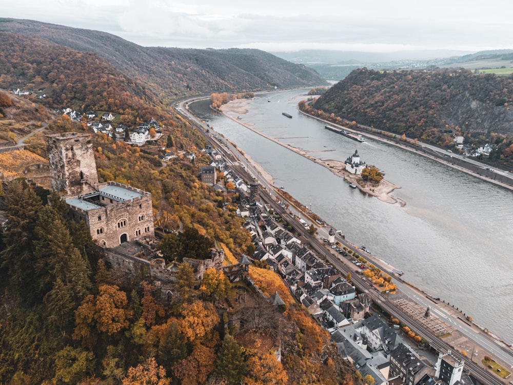 an aerial view of a river and a city