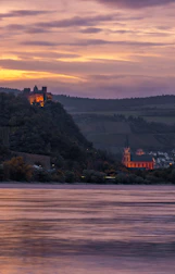 Scenic view of the Dordogne river near Castelnaud la Chapelle at sunset.