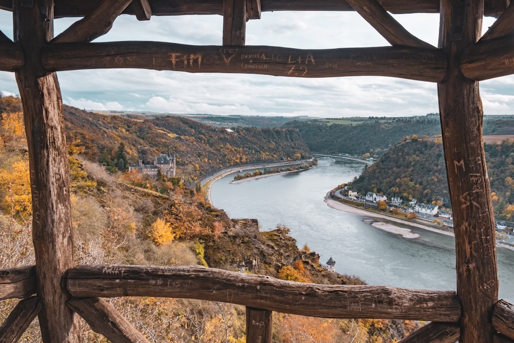 a view of a river from a wooden structure