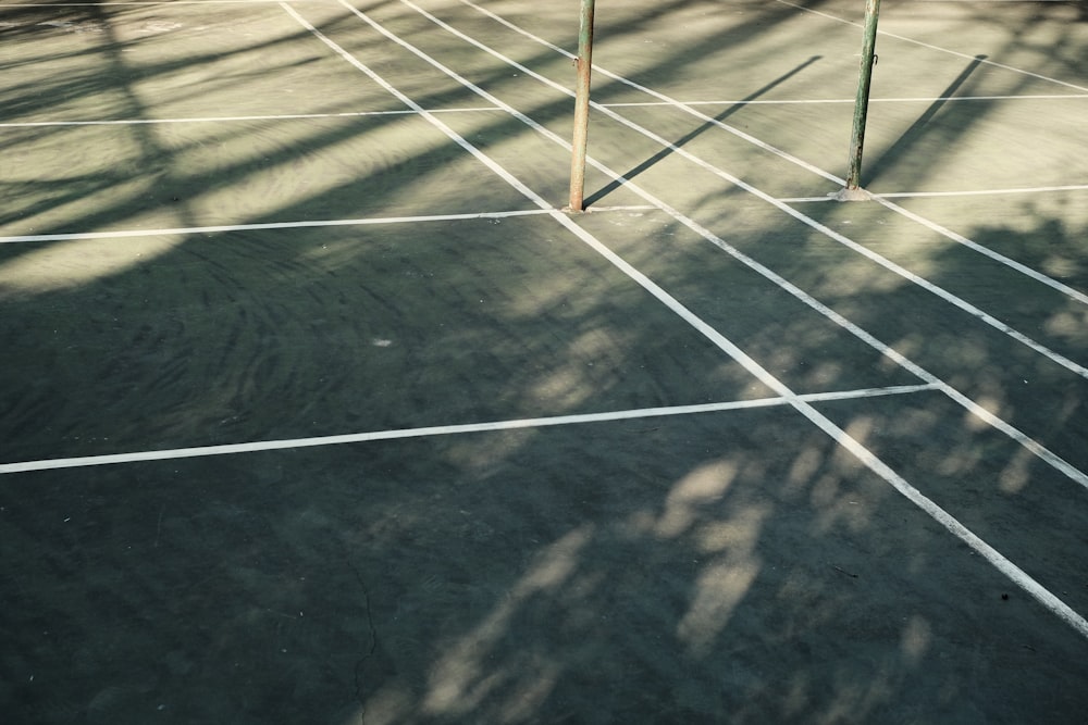 a tennis court with a tennis racket on it