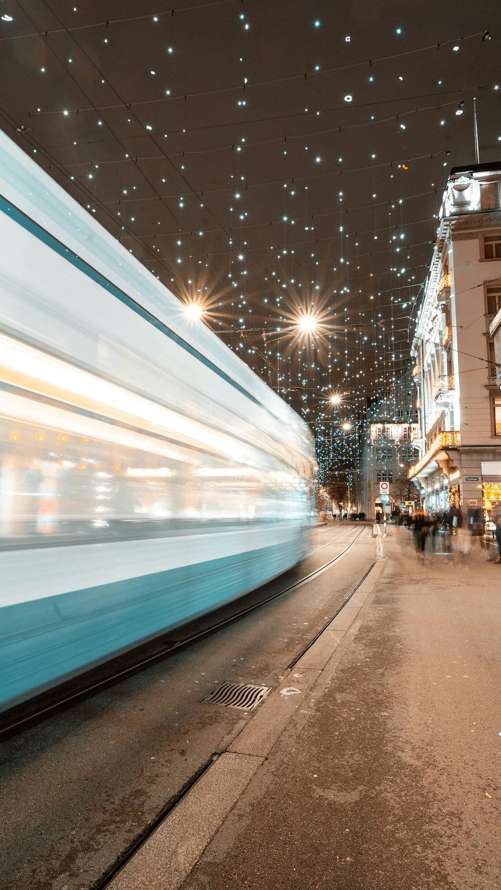 a blurry photo of a train on a city street