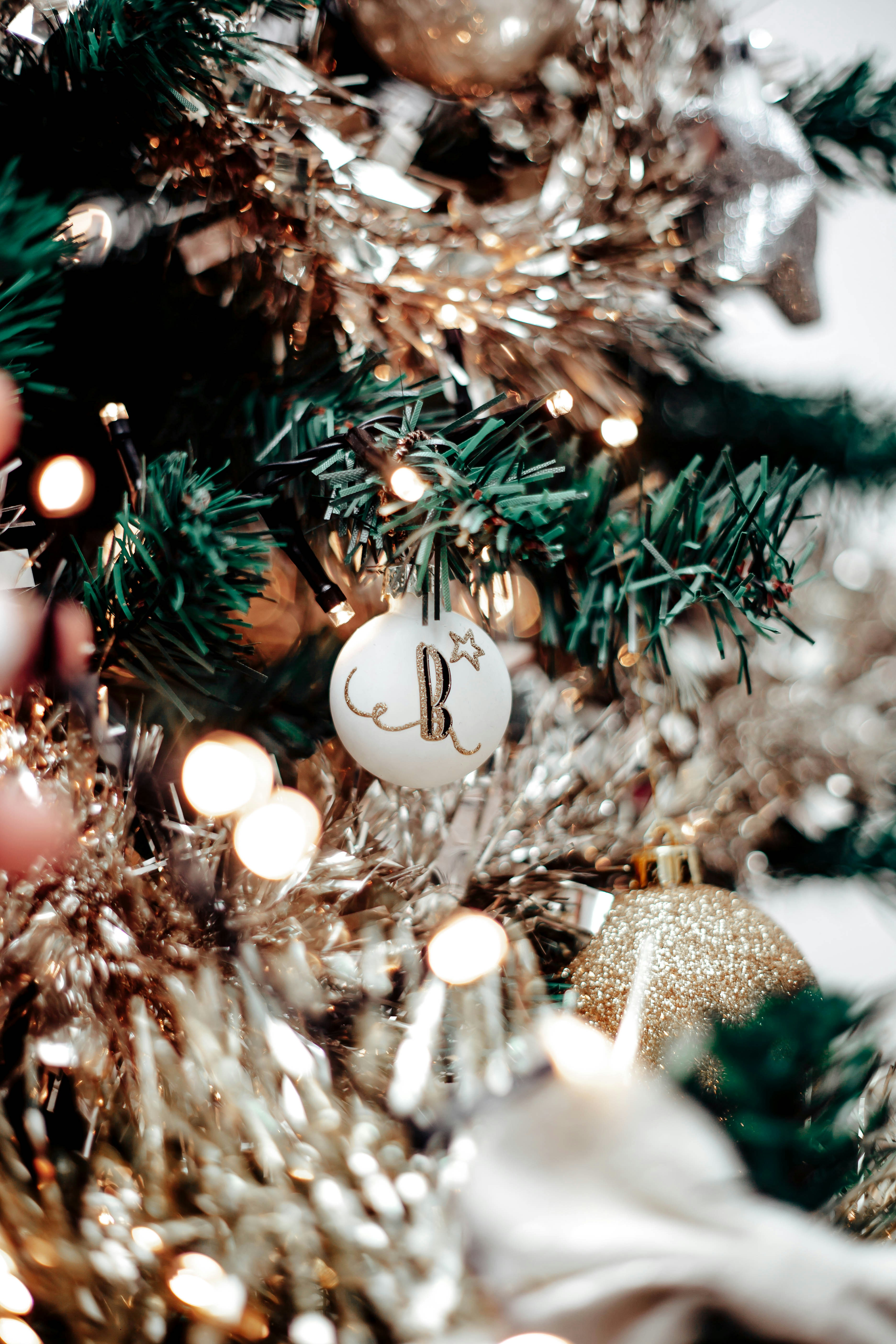 a close up of a christmas tree with ornaments