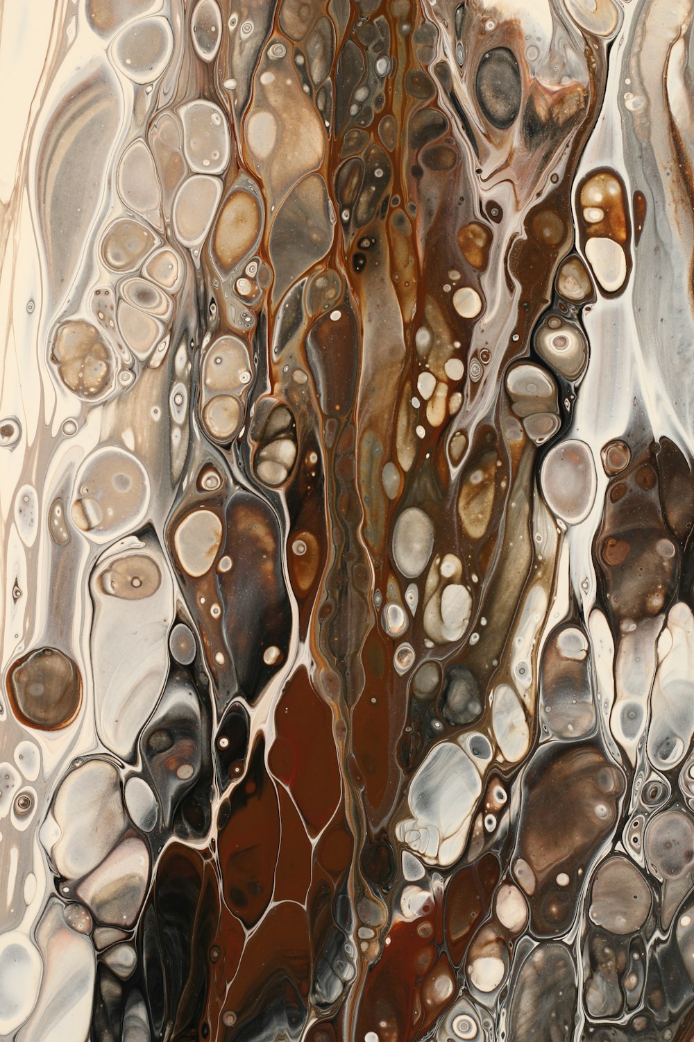 a close up of a painting with lots of bubbles