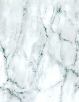 a close up of a white marble texture