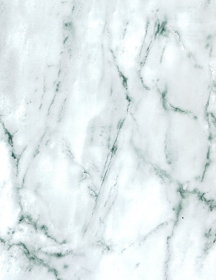 Close-up detail of polished white marble slab with grey veining