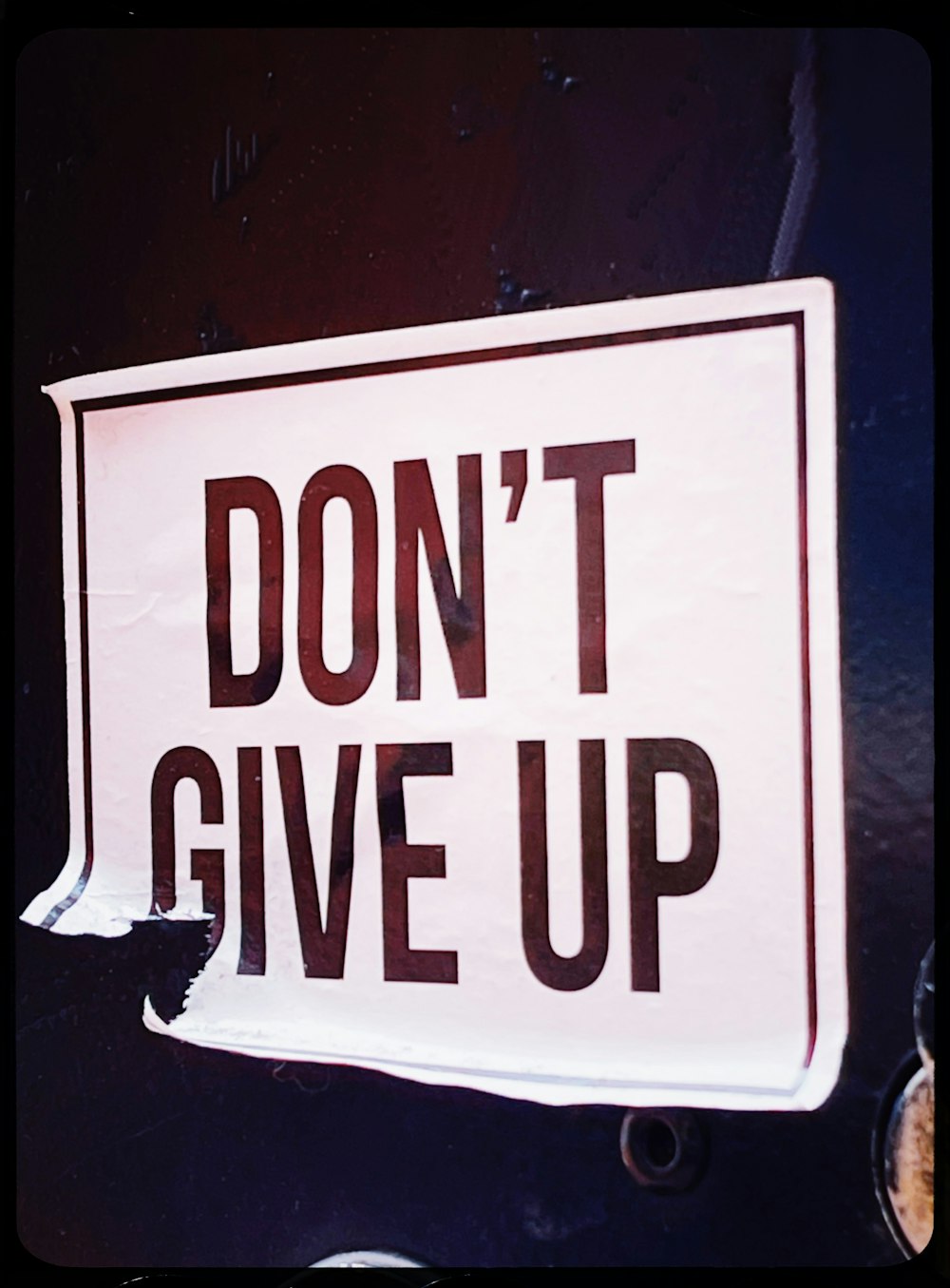 a sign that says don't give up on it