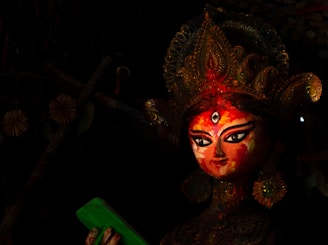 a close up of a person wearing a costume