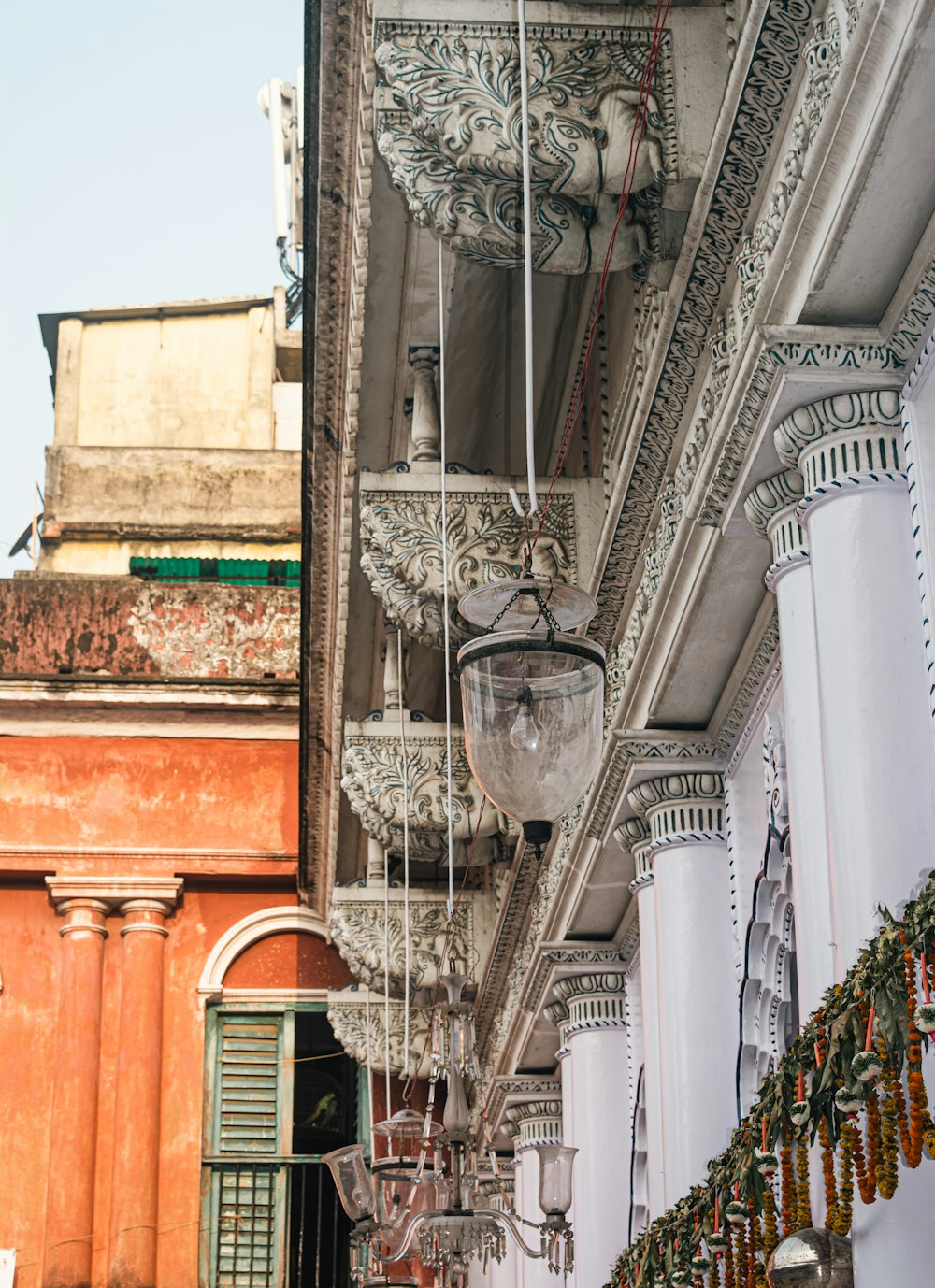 a street scene with focus on a light fixture