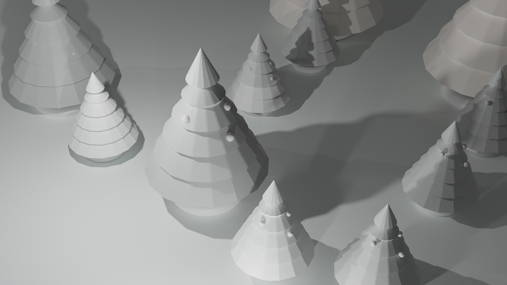 a group of paper trees sitting on top of a table