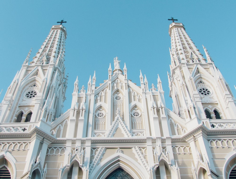 a large cathedral with a clock on the front of it