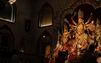 a statue of a person surrounded by other statues