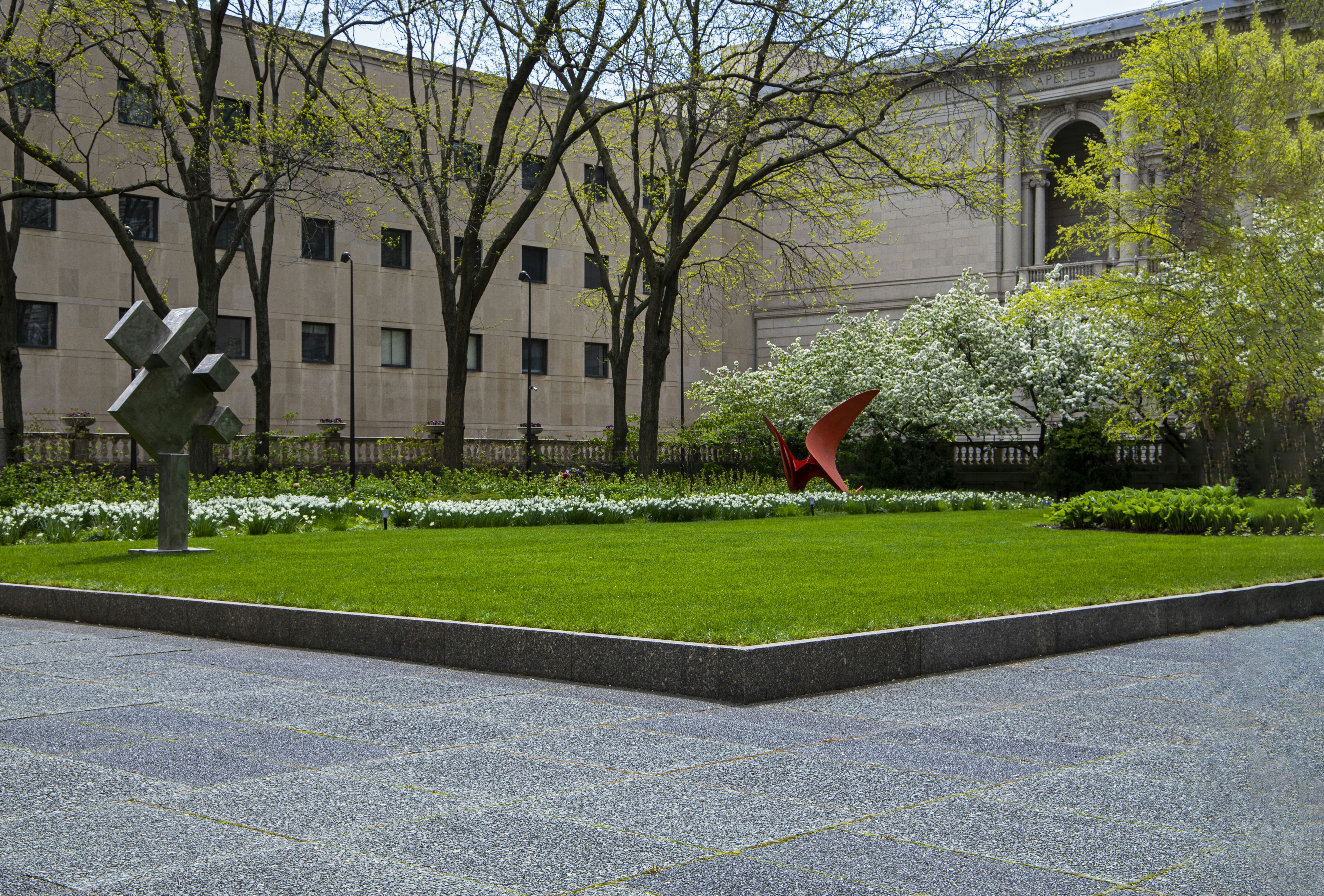 Campus green space with sculpture