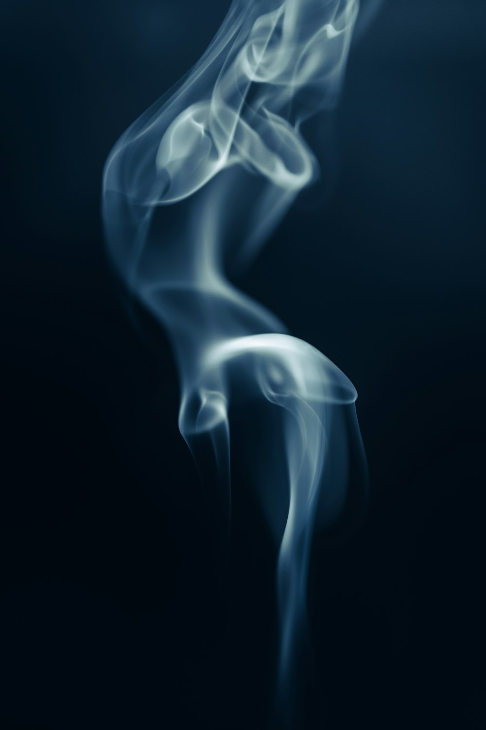 a blue smoke texture on a black background