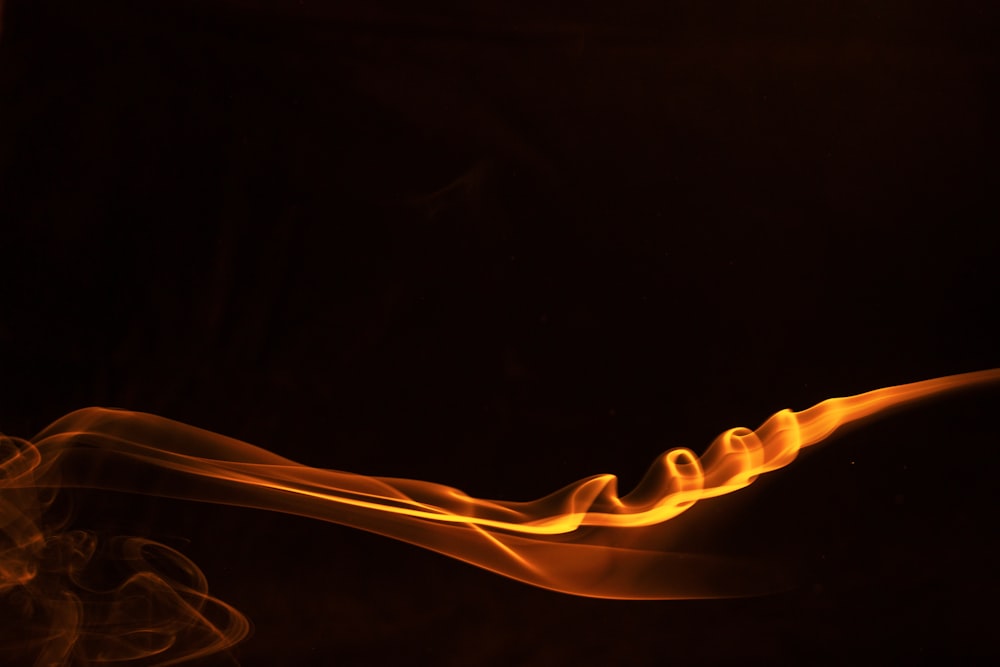 a close up of a fire on a black background