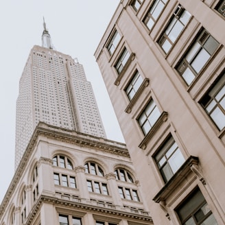 a tall building next to another tall building