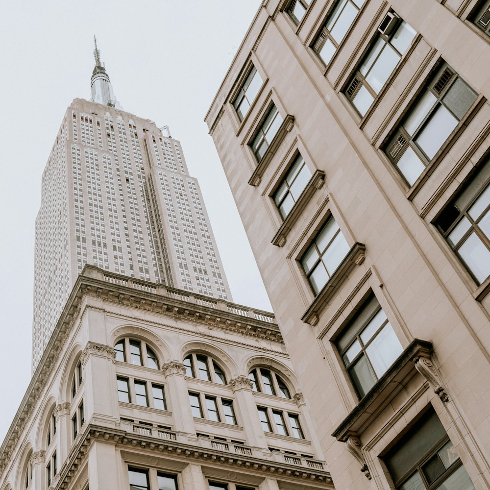 a tall building next to another tall building