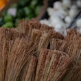 a close up of a bunch of brooms