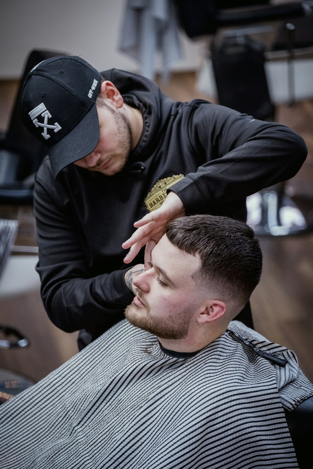 Man Getting His Hair Cut at a Barber Shop · Free Stock Photo
