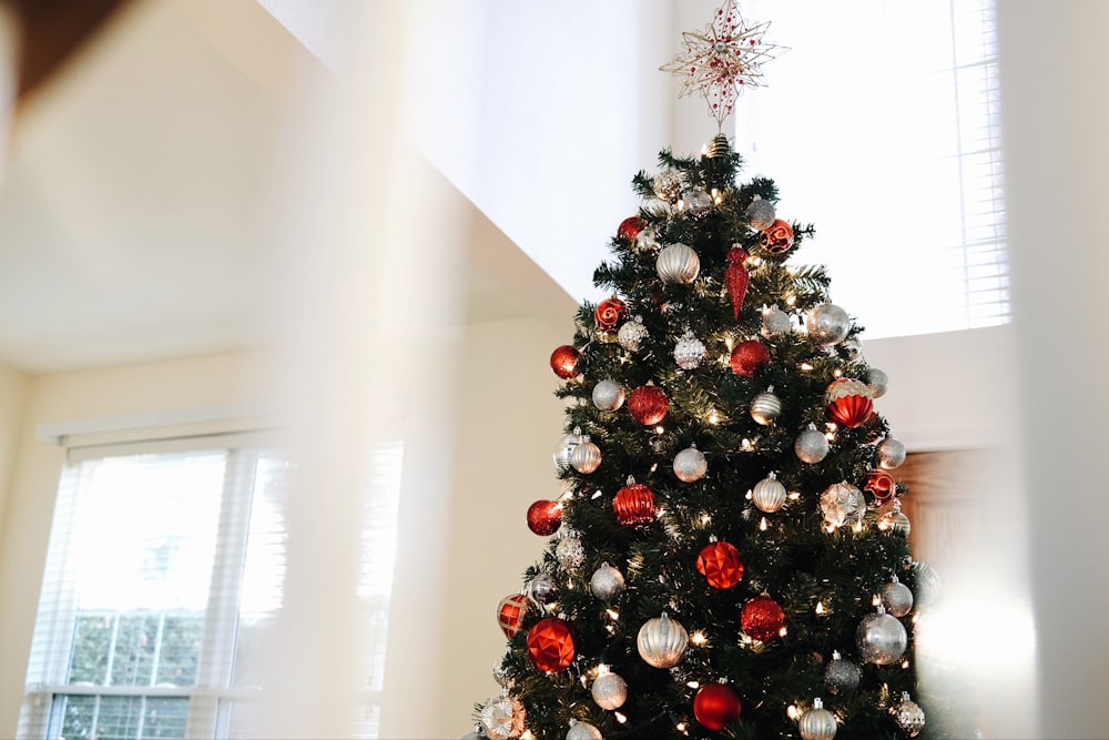 a decorated christmas tree in a living room