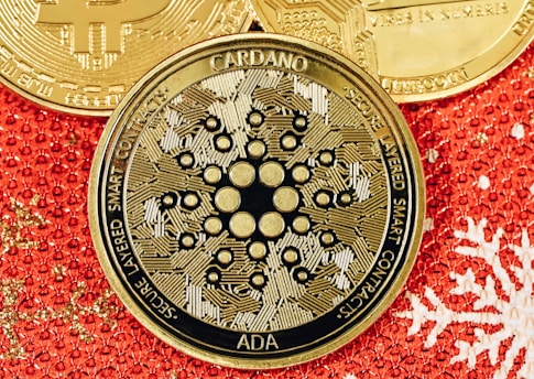 a bitcoin sitting on top of a red and gold background