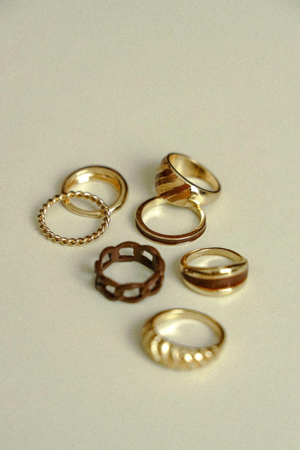 a bunch of rings sitting on top of a table
