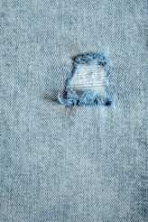 a hole in the back of a pair of jeans